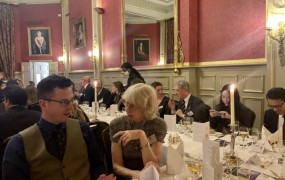 Guests in conversation during the London Dinner 