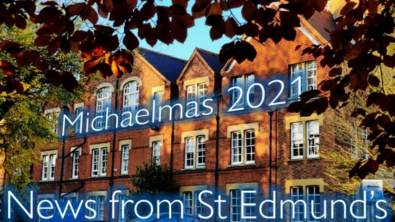 Michaelmas 2021 News from St Edmund's (text over an image of the Norfolk Building during golden hour with trees in every stage from green, through amber and brown, to barren and woody.