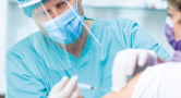 Picture of person being vaccinated by a doctor